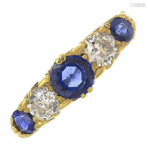 A sapphire and diamond five-stone ring.Total sapphire weight 0.83ct.Estimated total diamond weight