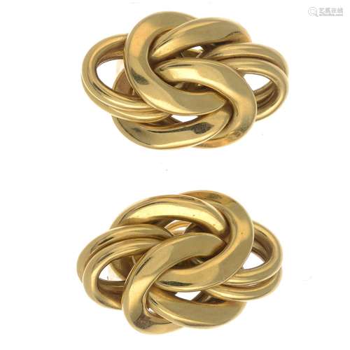 A pair of 18ct gold oval knot earrings.Import marks for London, 1993.Length 3.1cms.