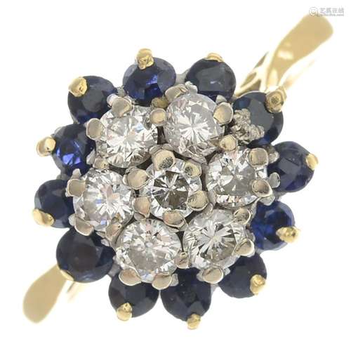 A mid 20th century 18ct gold diamond and sapphire floral cluster ring.Estimated total diamond