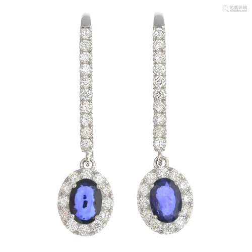 A pair of sapphire and diamond drop earrings.Sapphire calculated weight 1.52cts,