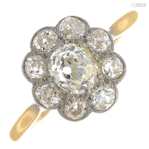 A diamond cluster ring.Estimated total diamond weight 1.10ct,