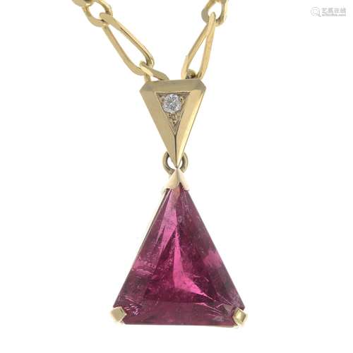 A 9ct gold pink tourmaline and diamond pendant, suspended from a figaro chain.