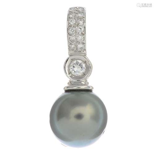 An 18ct gold cultured pearl and diamond pendant.Principal diamond estimated weight 0.10ct,