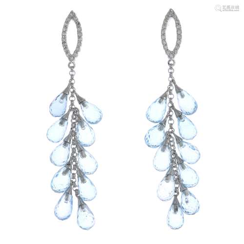A pair of blue topaz and diamond drop earrings.Estimated total diamond weight 0.30ct.Marked