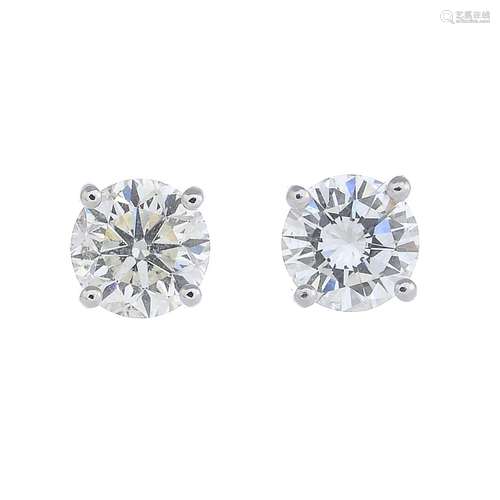 A pair of 18ct gold brilliant-cut diamond stud earrings.