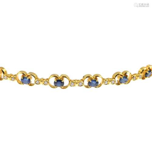 A sapphire and diamond bracelet.Total diamond weight 0.41ct,