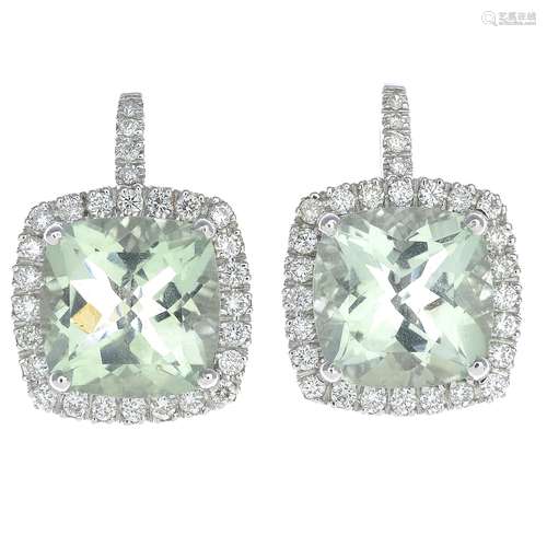 An 18ct gold prasiolite and diamond cluster earrings.Prasiolite calculated total weight 8.11cts,