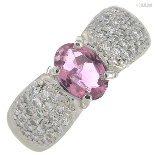 A platinum pink tourmaline and diamond dress ring.Tourmaline calculated weight 0.58ct,