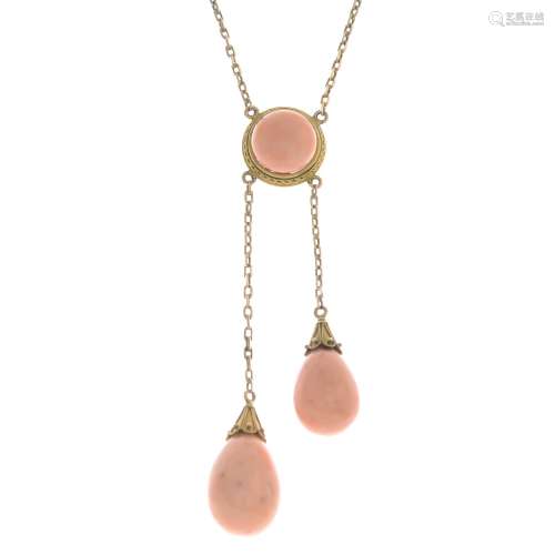 An early 20th century gold coral negligee pendant,