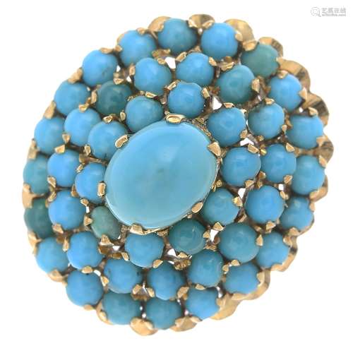 A turquoise cluster ring.Approximate ring size J.