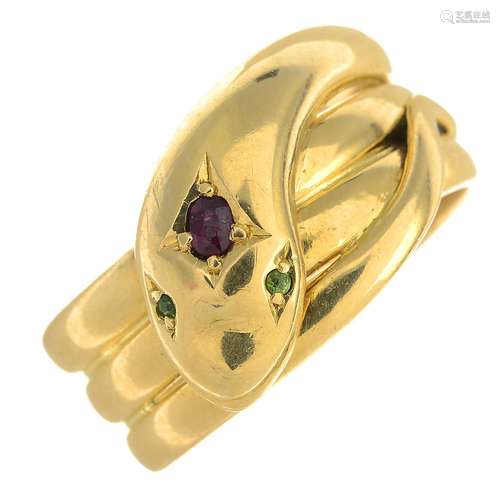 A late Victorian 18ct gold ruby and green gem snake ring.Hallmarks for Chester,