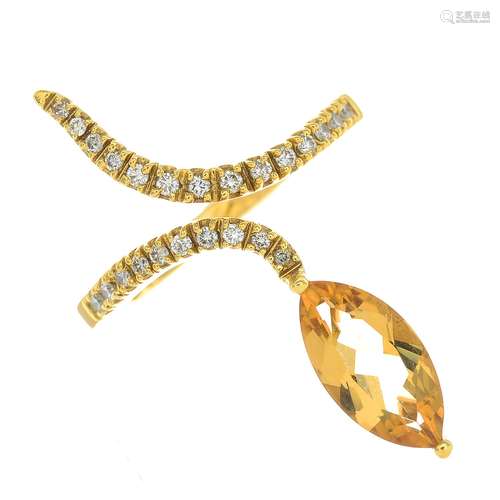 An 18ct gold citrine and diamond dress ring.Citrine calculated weight 1.39cts,