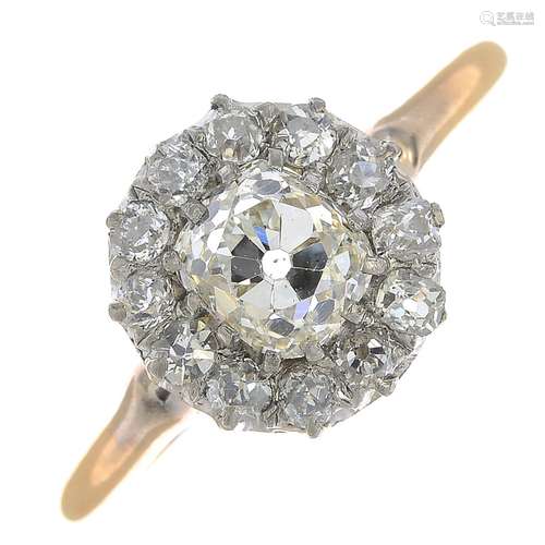 A diamond cluster ring.Principal diamond estimated weight 0.90ct,