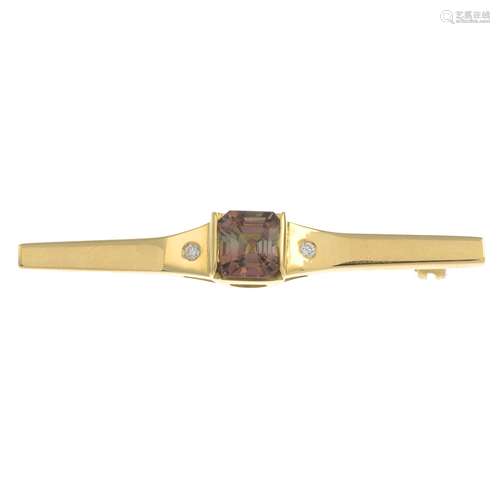 An 18ct gold pink tourmaline and diamond brooch.Tourmaline calculated weight 1.89cts,