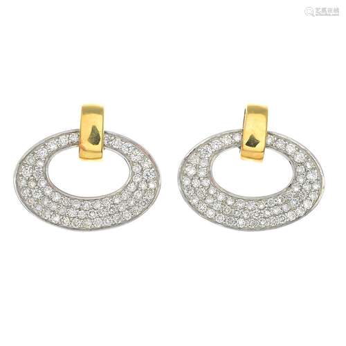 A pair of 18ct gold diamond earrings.Total diamond weight 0.55ct.Hallmarks for London.Length