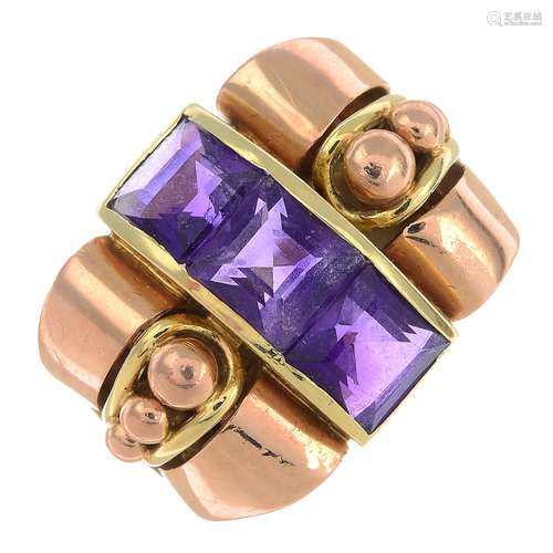 An amethyst dress ring.Total amethyst calculated weight 3.09cts,