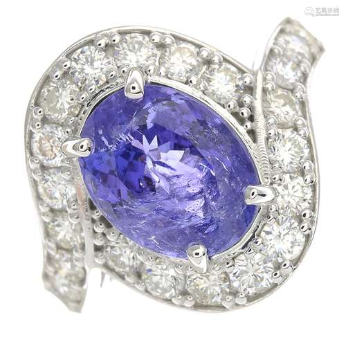 A tanzanite and diamond dress ring.Tanzanite calculated weight 3.46cts,