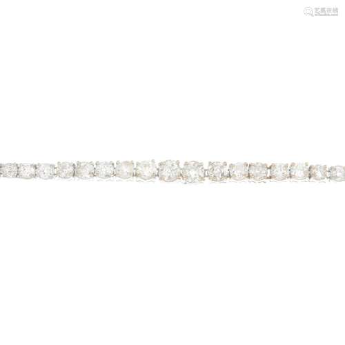 A graduated old-cut diamond line bracelet.Estimated total diamond weight 8.75cts,