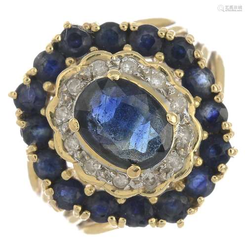 A sapphire and diamond cluster ring.Principal sapphire calculated weight 1.61cts,