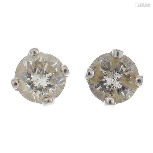 A pair of 18ct gold brilliant-cut diamond single-stone stud earrings.Estimated total diamond weight