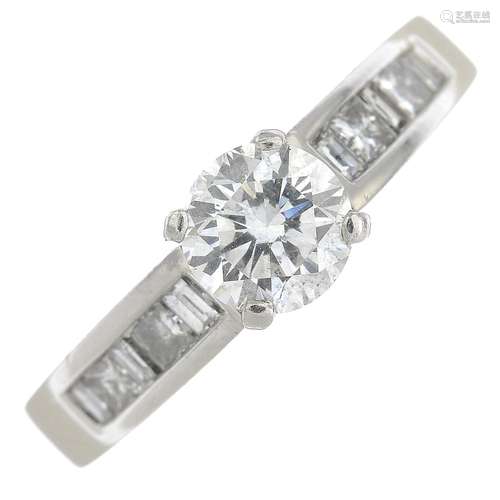 A platinum diamond dress ring.Principal diamond estimated weight 1ct,