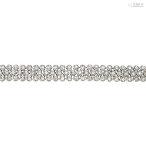 A diamond bracelet.Estimated total diamond weight 1.80cts.with Italian marks.Stamped 750.Length