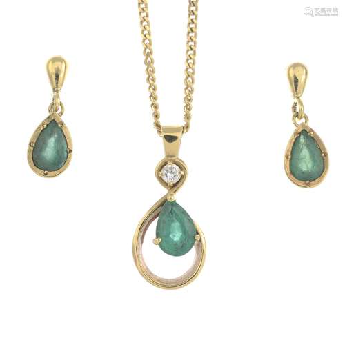 An 18ct gold emerald and diamond pendant,