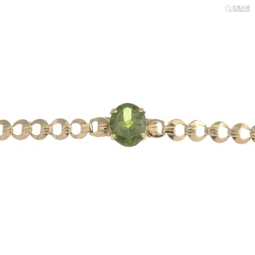 A 9ct gold peridot bracelet.Hallmarks for Birmingham, 1963.Length 16.5cms.