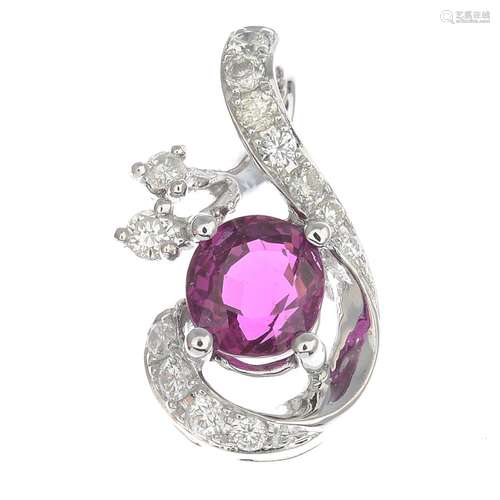 A ruby and diamond pendant.Ruby calculated weight 0.95ct,