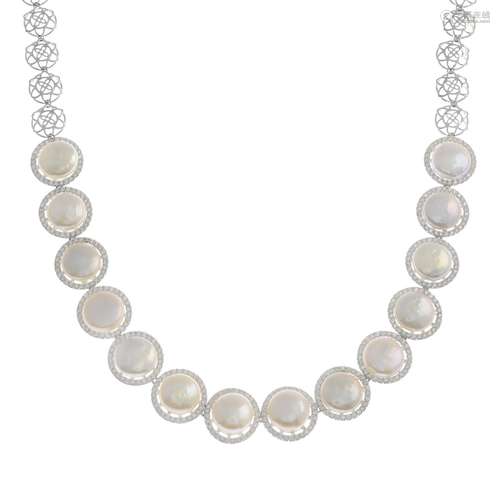 A mabe pearl and diamond necklace.Approximate dimensions of one mabe pearl 12.7mms.