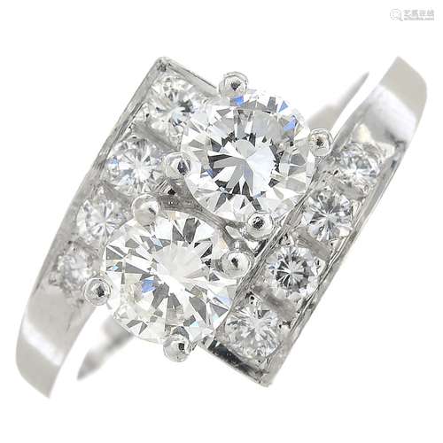 A diamond dress ring.Estimated total diamond weight 1.10cts,