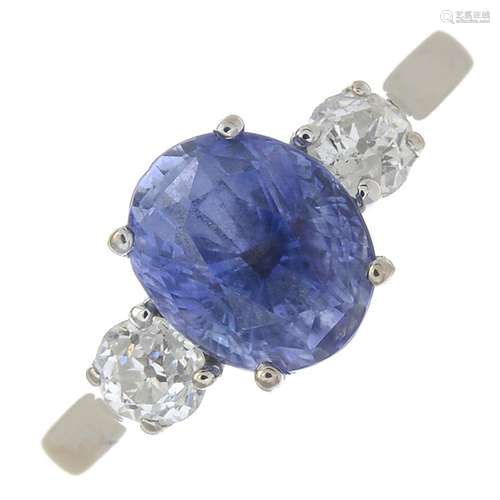 An 18ct gold sapphire and diamond three-stone ring.