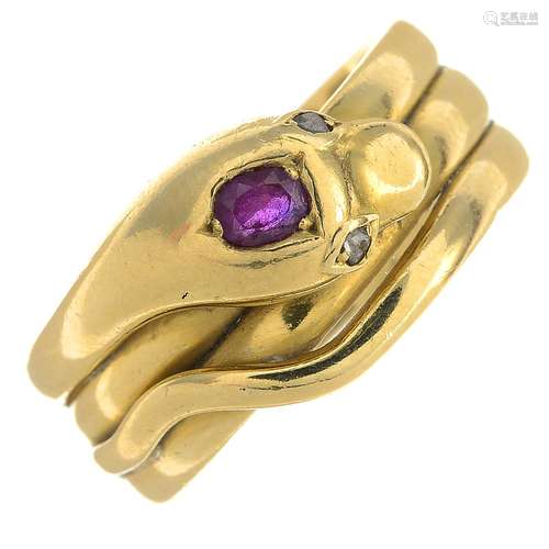 A late Victorian 18ct gold ruby and diamond snake ring.Hallmarks for Birmingham, 1873.Ring size O.