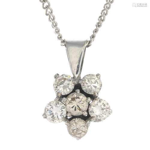 A diamond cluster pendant,