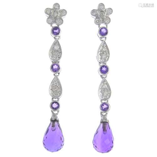 A pair of amethyst and diamond drop earrings.Estimated total diamond weight 0.20ct.Marked