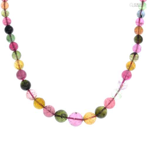 A graduated vari-hue tourmaline bead necklace.Approximate dimensions of tourmaline 4.5 to