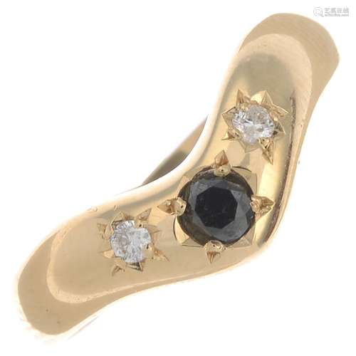 An 18ct gold sapphire and diamond wishbone ring.Hallmarks for Edinburgh, 2002.Ring size M.