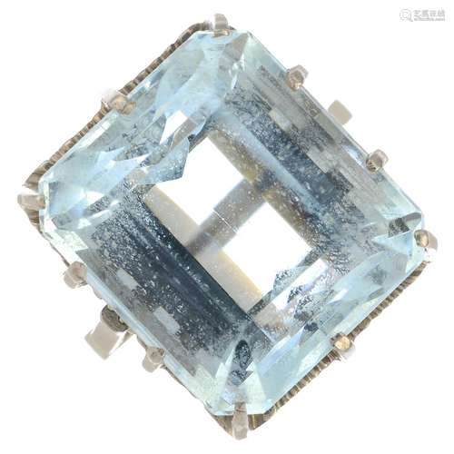 An aquamarine single-stone ring.Aquamarine calculated weight 21.34cts,