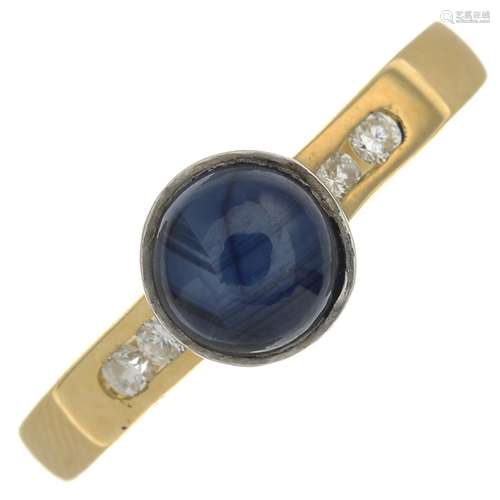 An 18ct gold sapphire and diamond ring.Hallmarks for Birmingham, 1999.Ring size P.