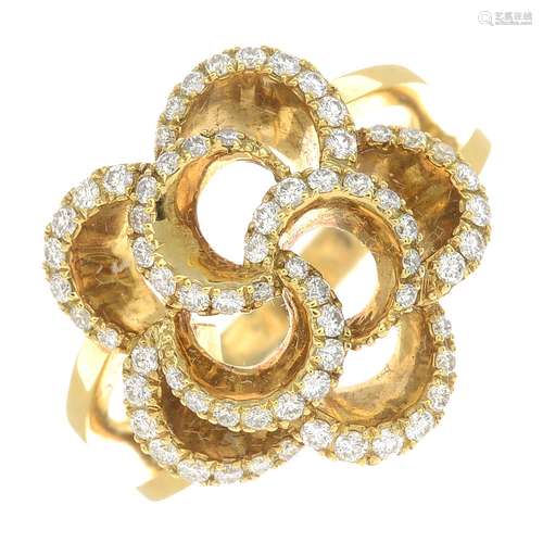 An 18ct gold diamond floral dress ring.Total diamond weight 0.48ct,