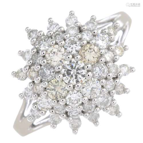 A diamond cluster ring.