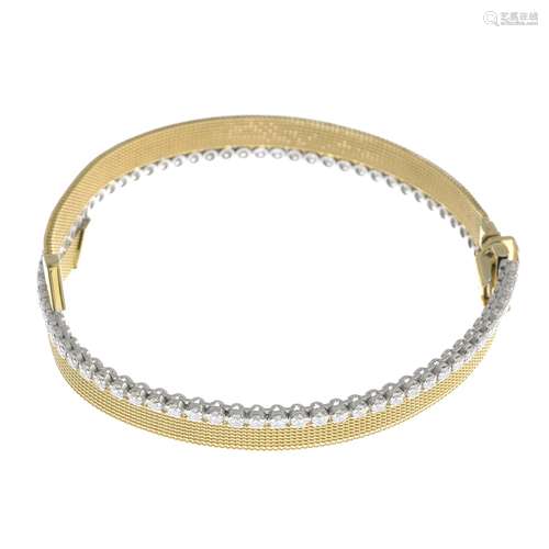 An 18ct gold cubic zirconia bracelet.Hallmarks for London, 2009.Italian marks.Length 18cms.