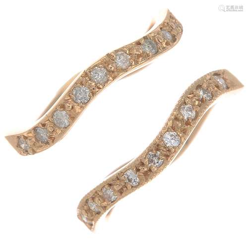 Two 18ct gold diamond half eternity rings.Estimated total diamond weight 0.25ct.Hallmarks for