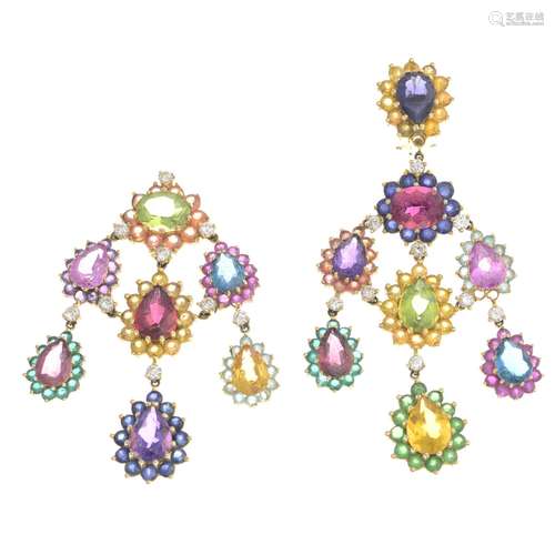 A pair of multi-gem earrings.