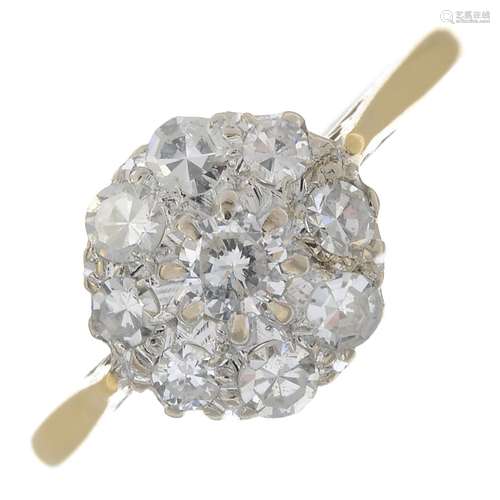 A diamond cluster ring.Estimated total diamond weight 0.65ct,