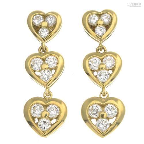 A pair of 18ct gold diamond heart earrings.Estimated total diamond weight 1ct,