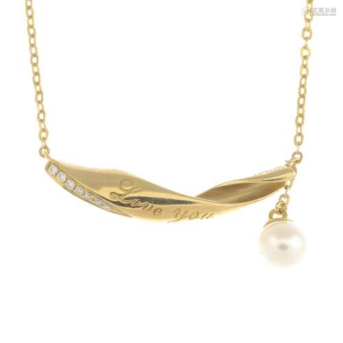 A cultured pearl and diamond pendant, suspended from integral chain.Stamped 18K.Length 43cms.