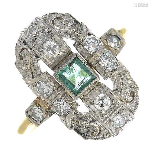 An emerald and diamond dress ring.Estimated total diamond weight 0.40ct.Ring size N.