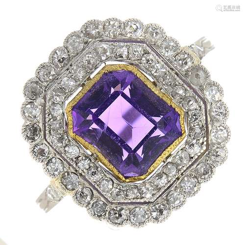 An amethyst and diamond cluster ring.