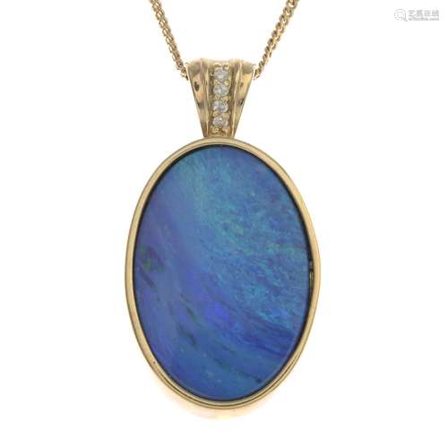 A 9ct gold boulder opal and diamond pendant, suspended from a chain.Length of pendant 4cms.